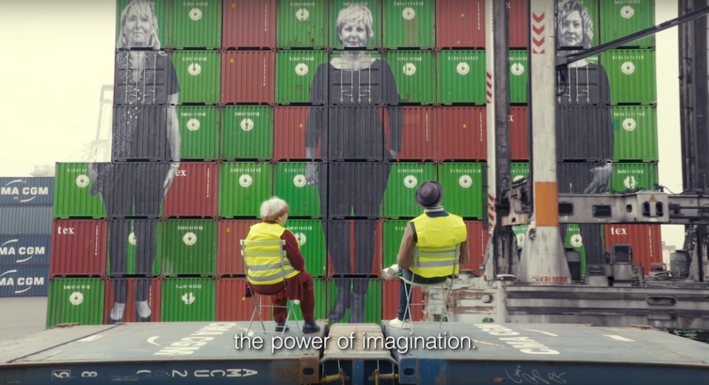 A person standing in front of a building