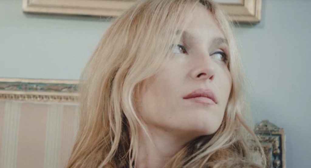 A woman looking at the camera