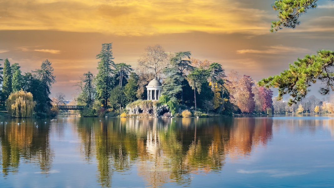 Vincennes, the temple of love and artificial grotto on the Daumesnil lake, in the public park, in autumn