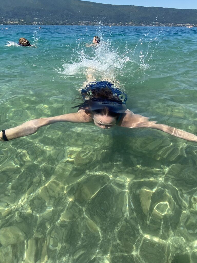 A man swimming in the water