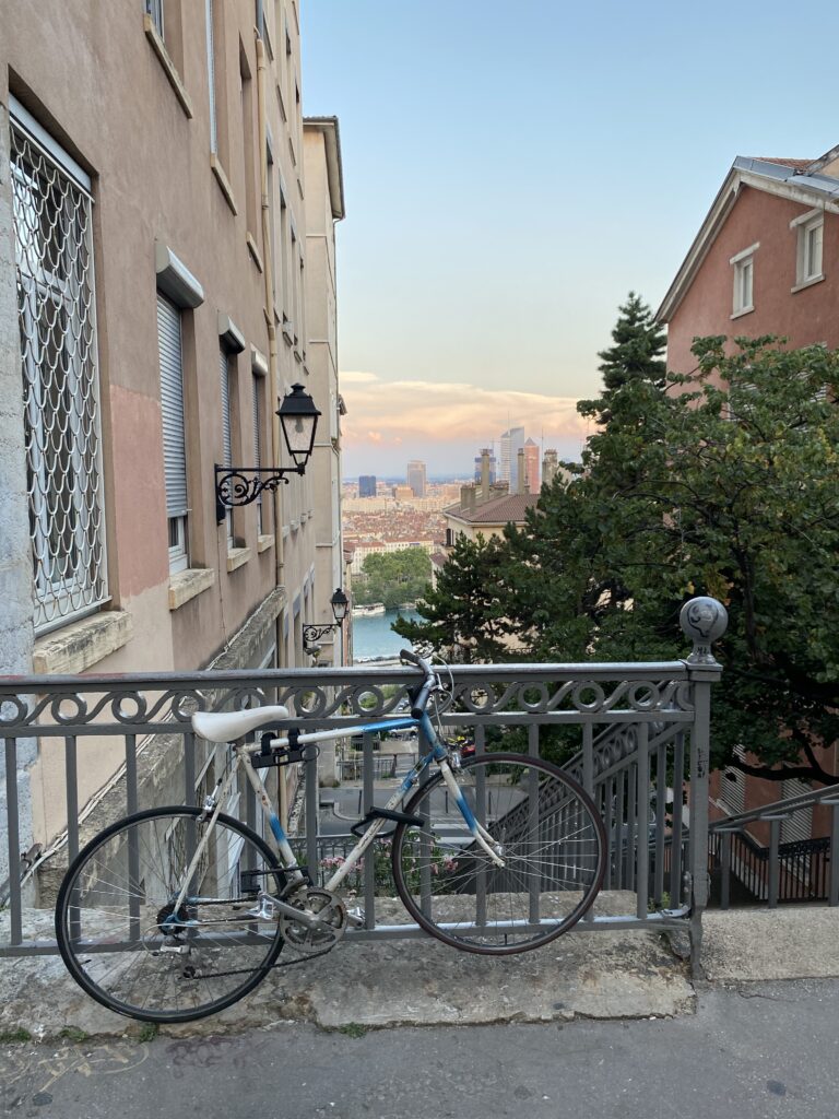 A bicycle parked on the side of a building