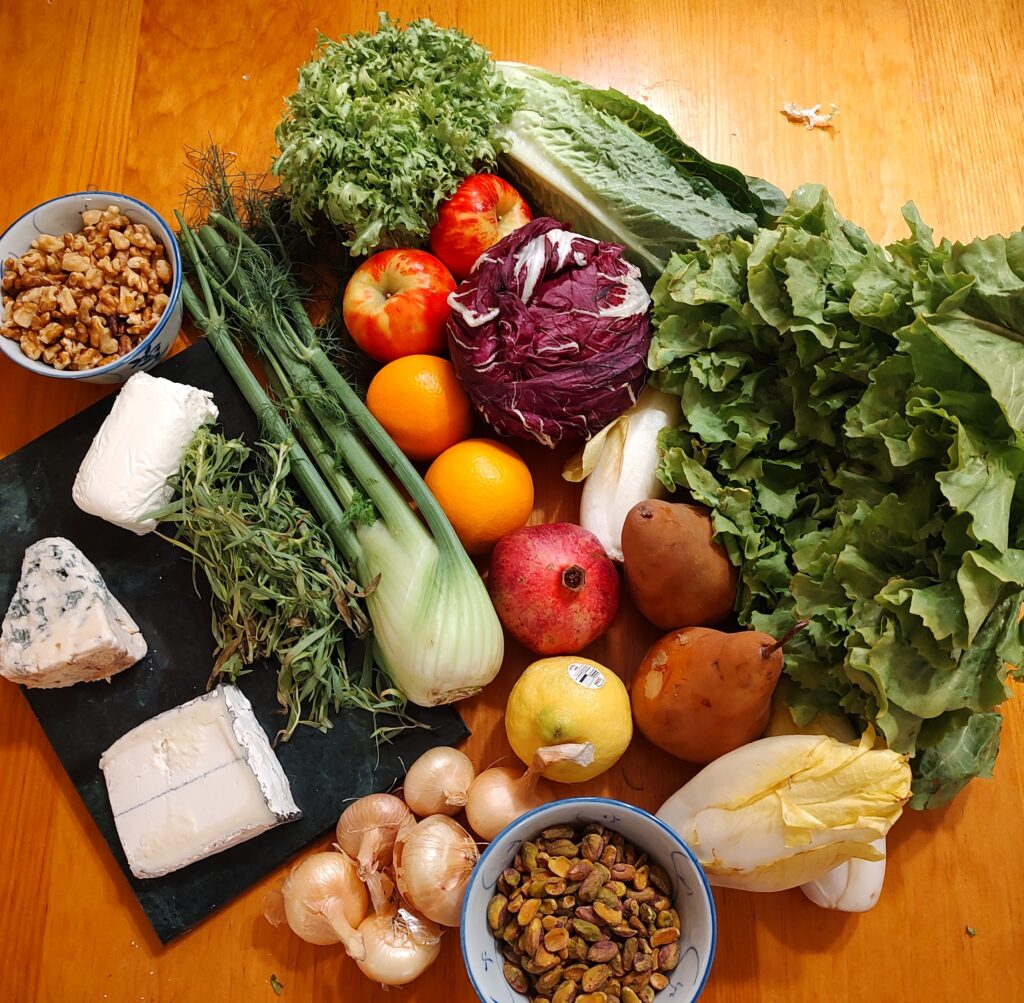A variety of fresh vegetables on a wooden table