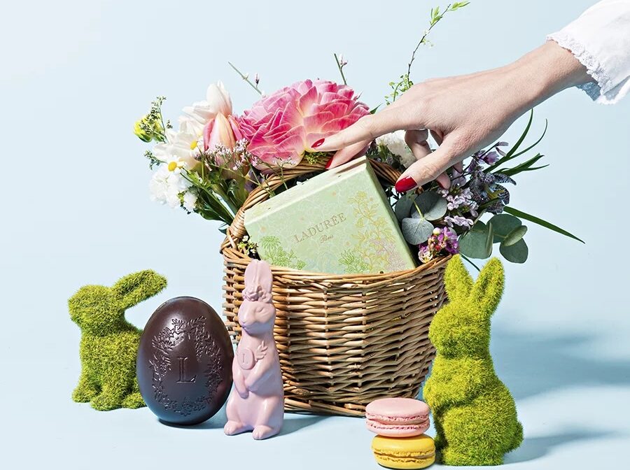 Laduree Easter eggs and bunnies next to a flower basket.