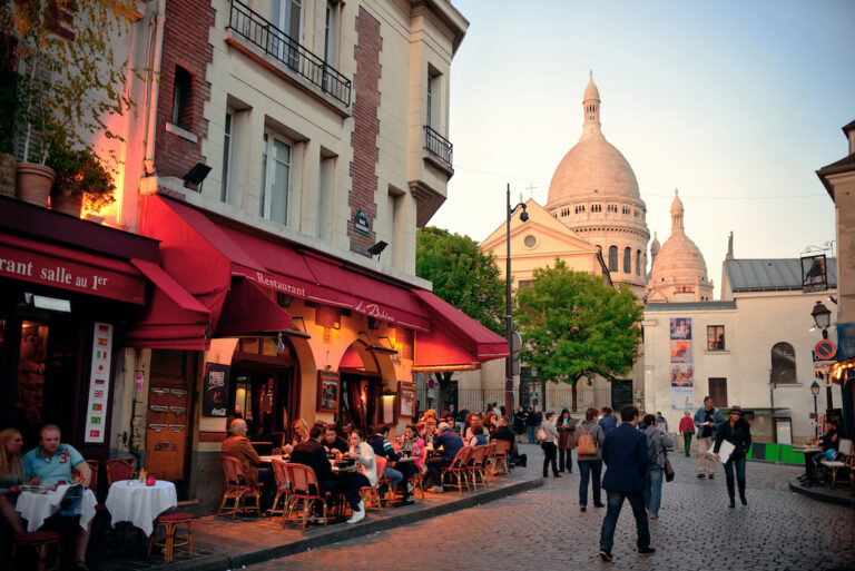 PARIS, FRANCE - MAY 13: City street view on May 13, 2015. With the population of 2M, Paris is the capital and most-populous city of France.
