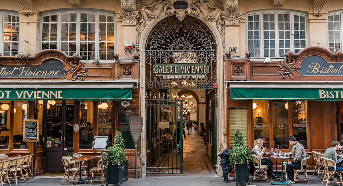 PARIS, FRANCE - MARCH 8, 2015: Galerie Vivienne (1823). Vivienne Covered Passage is 176 meters long, with shops, restaurants and tourist attraction.