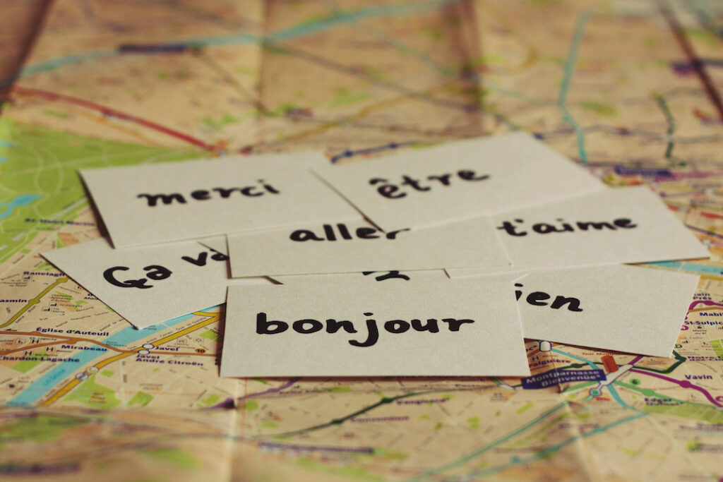 Flash cards with French words on the map of Paris