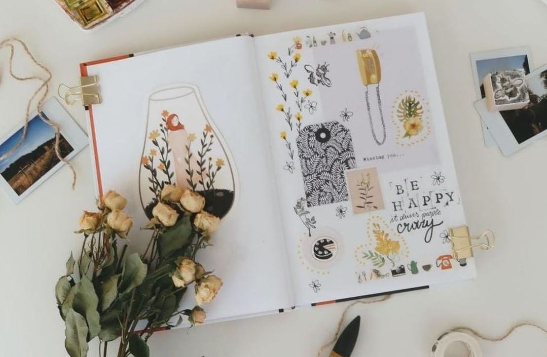 Crafting notebook with dried flowers