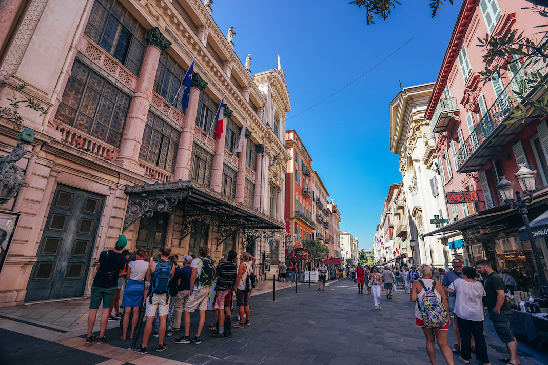 Nice, France - September 13, 2019: A normal tour day in Nice. Walking tours take visitors around the Old Town to show the architecture and explain the history of the key tourist spots.