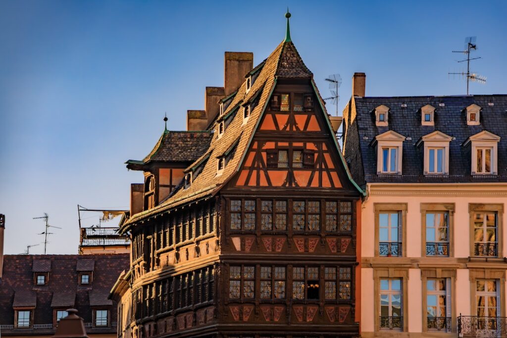 Strasbourg, France - May 31, 2023: Maison Kammerzell House restaurant in an ornate medieval 15th century half timbered house on Cathedral Square