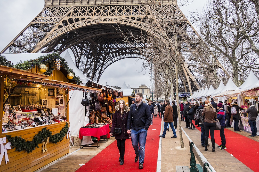 PARIS, FRANCE - DECEMBER 22, 2017: Traditional Christmas markets near the Eiffel tower on Champ de Mars in Paris.