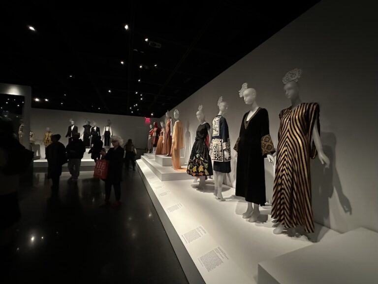 Lineup of mannequins in fashion exhibit