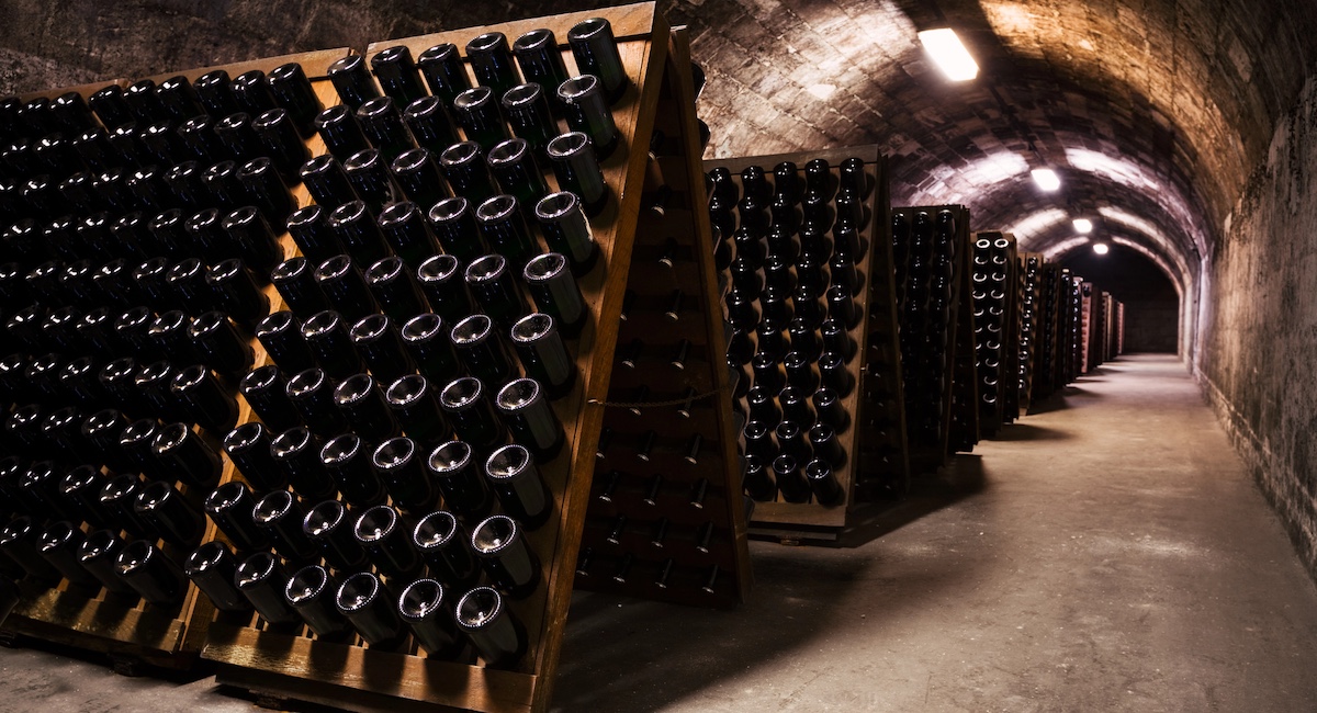 Champagne cellar full of bottles
