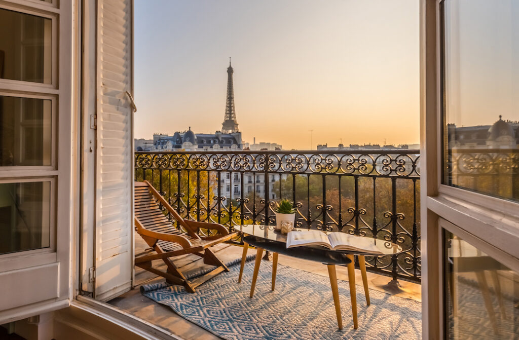 paris balcony with splendid view on eiffel tower at sunset