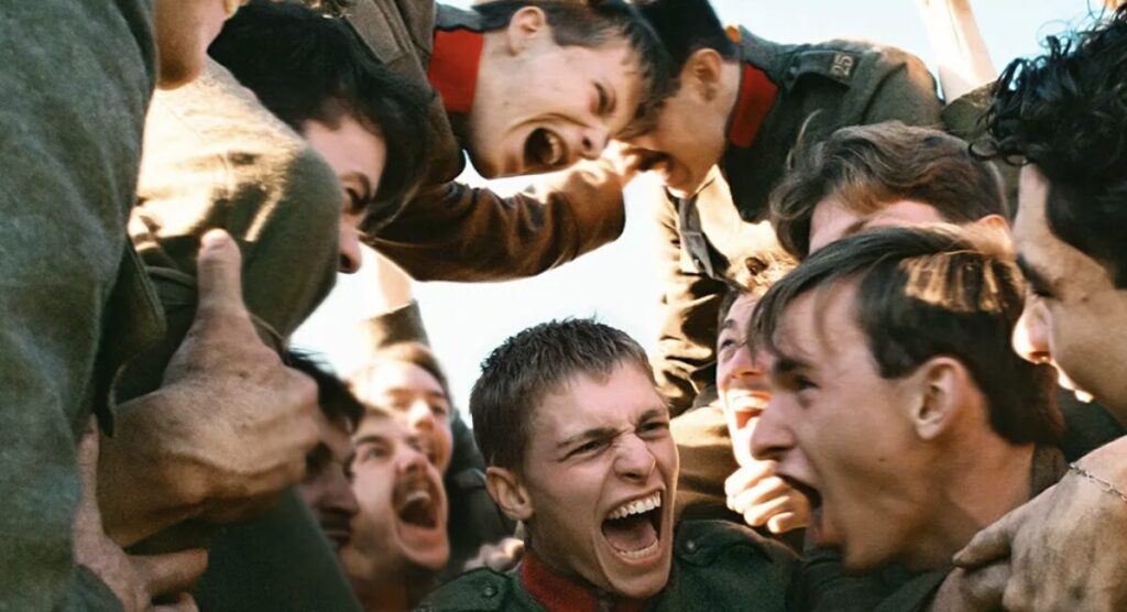 Men laughing in a huddle