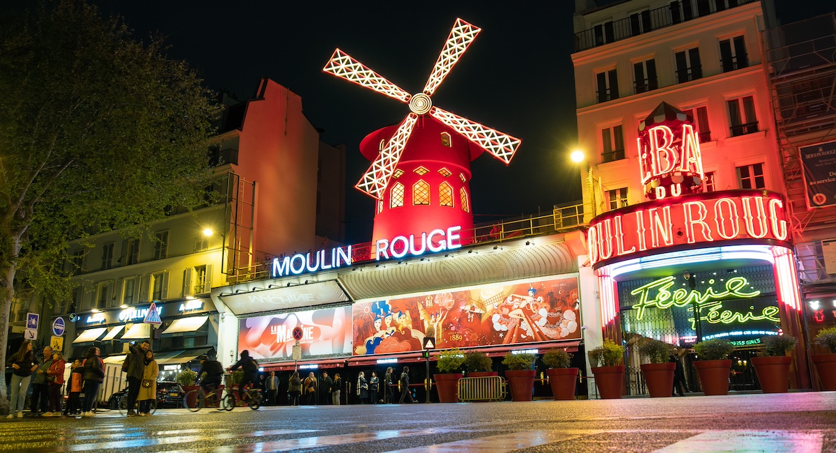 Things to do in Paris at night: attend a cabaret show at the famous Moulin Rouge.