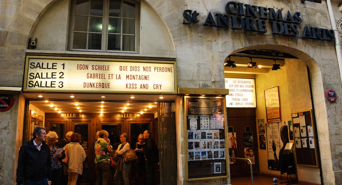 Things to do in Paris at night: catch a movie at a historic cinema.