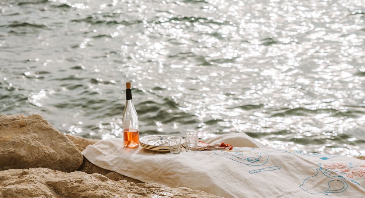 Bottle of rosé by the ocean