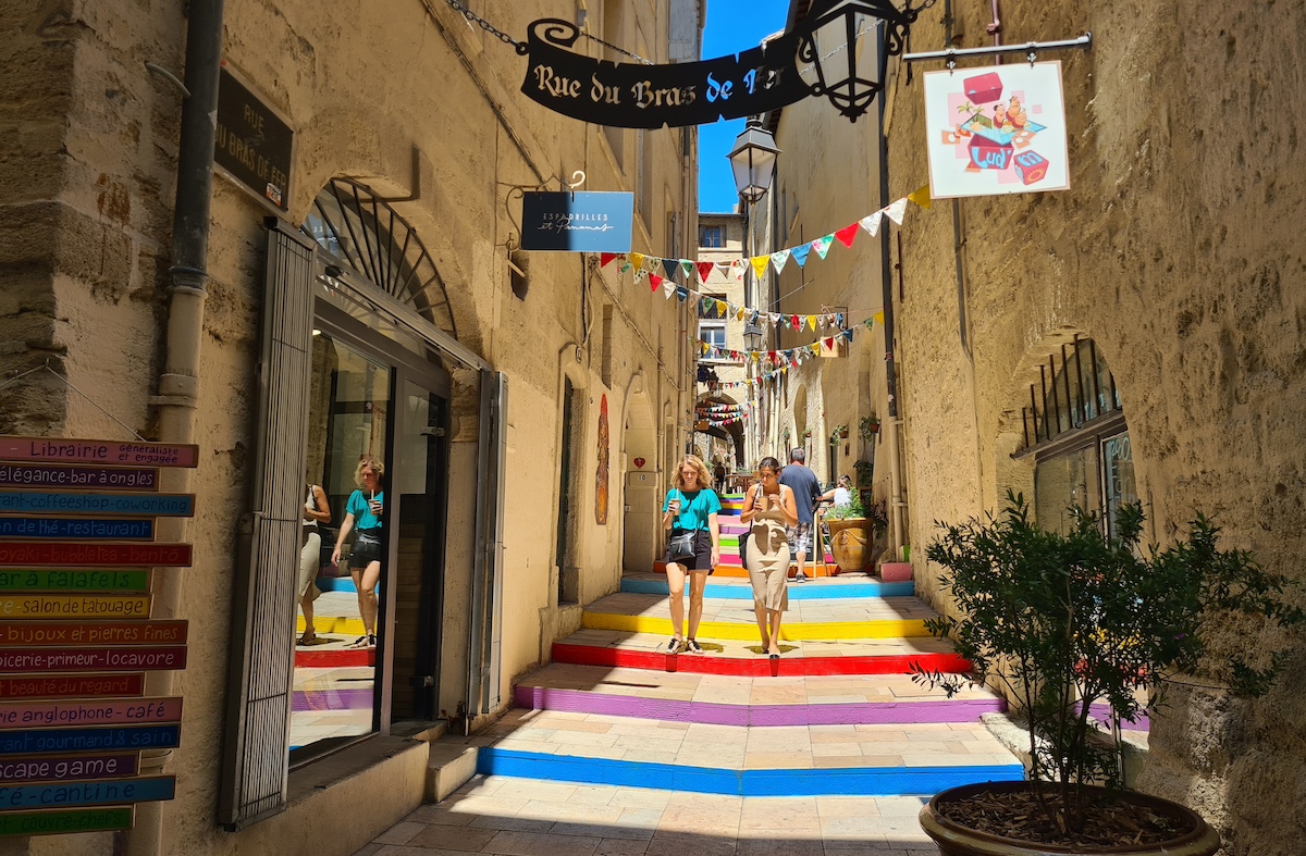 Montpellier, France – June 24, 2023: Traditional French architecture in Rue de Bras de Fer in Montpellier, France.