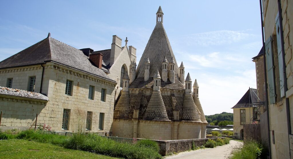 The exterior of the kitchen of Fontevraud Abbey. Loire Valley, France. June, summer.