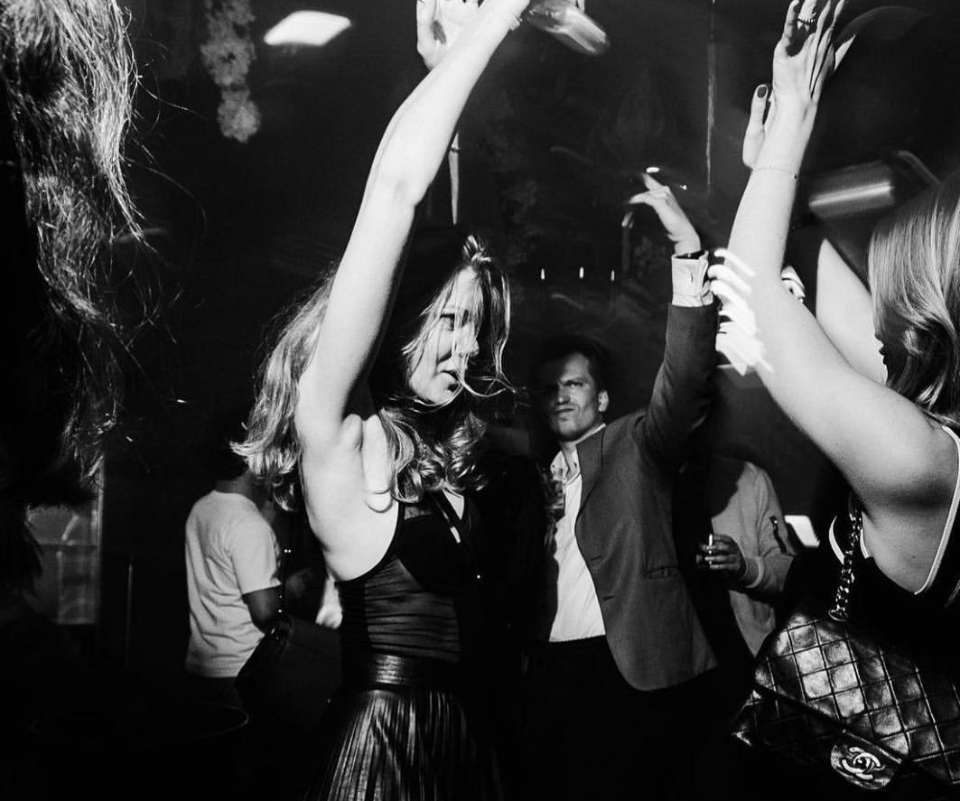 People dancing in black and white