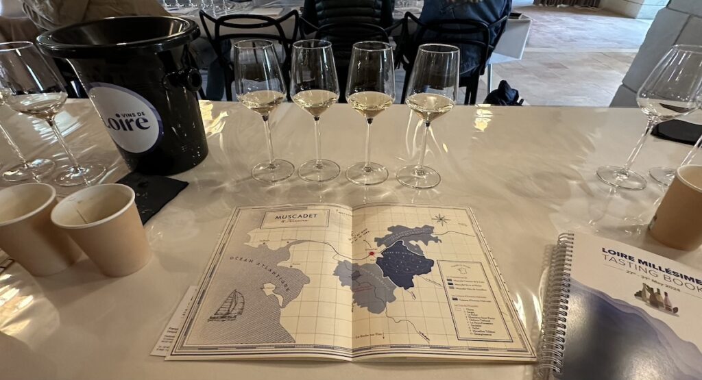 Wine glasses and map of the Loire Valley