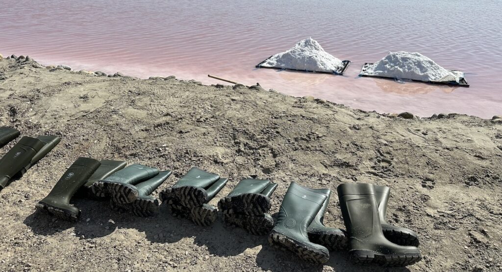 Work boots by salt marshes in the Camargue