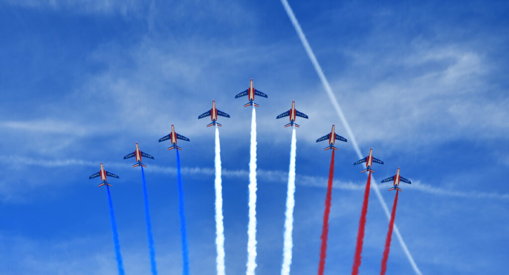 Jets streaming red, white, and blue