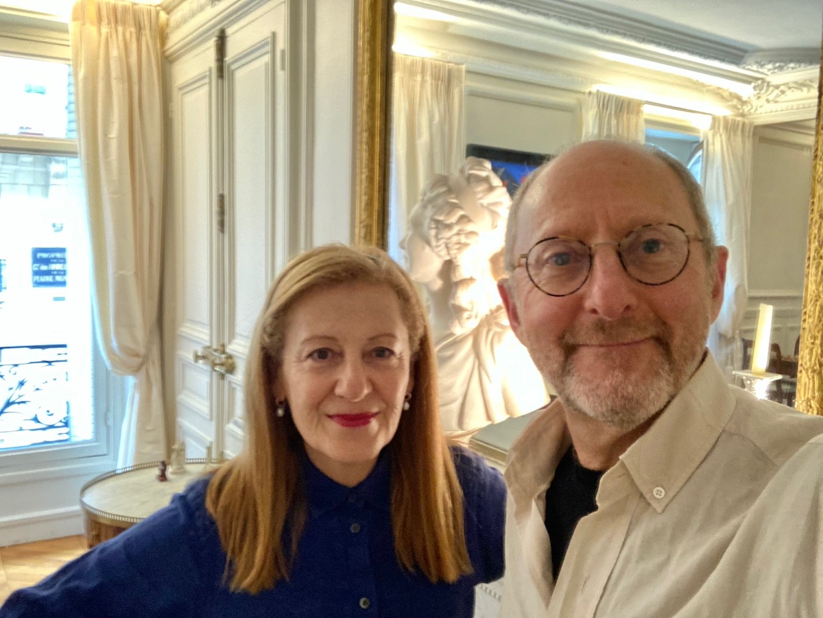 Couple standing in Haussmannian apartment in Paris