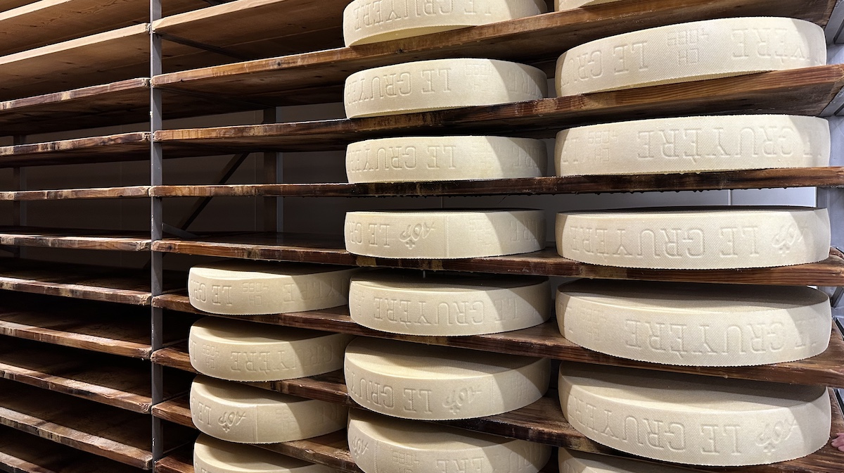 Wheels of gruyere in storage facility