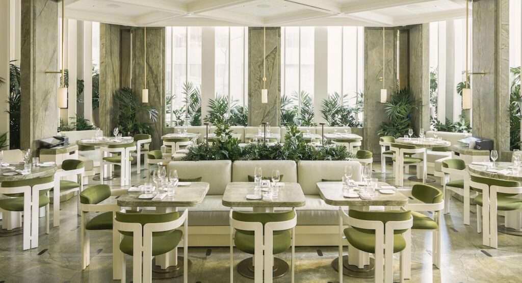 Restaurant interior in shades of white and green