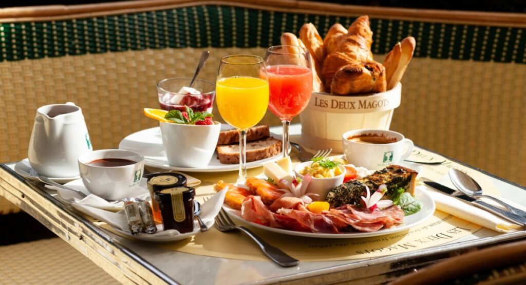 Brunch spread with croissants and mimosas.
