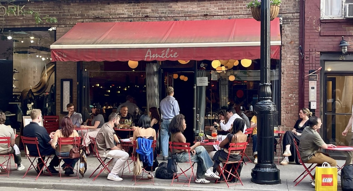 Outdoor cafe seating at Amelie in the West Village.