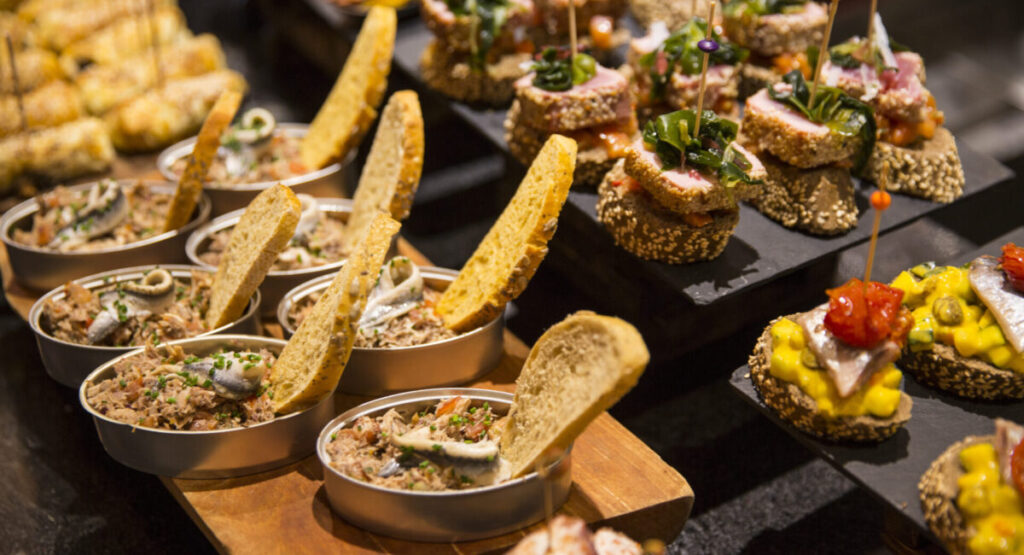 Gourmet appetizers elegantly displayed at an upscale event