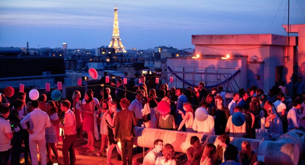People partying on Paris rooftop