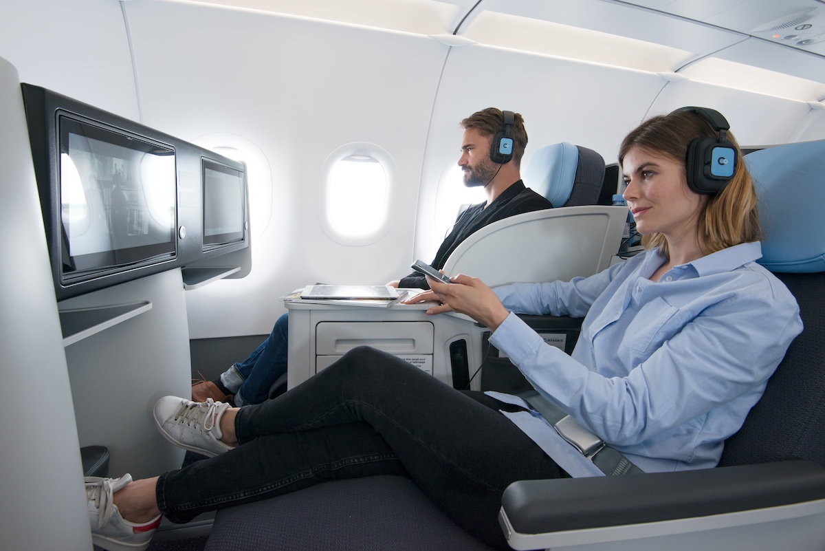 Man and woman flying La Compagnie airline