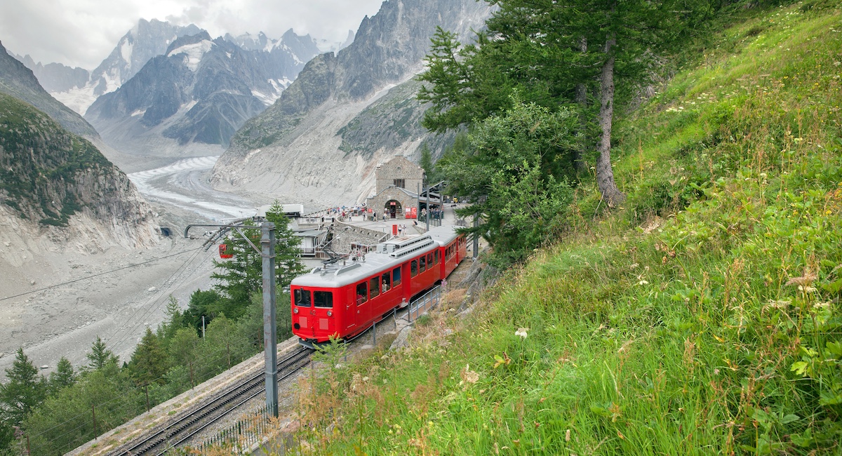 A red train in French Alps in summer season