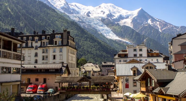 Town of Chamonix-Mont-Blanc in summer, with mountains in the background