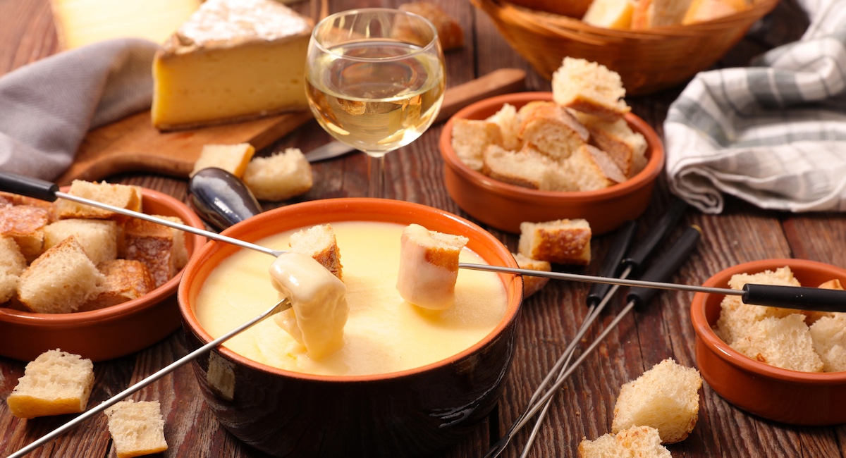 Traditional fondue with white wine and bread