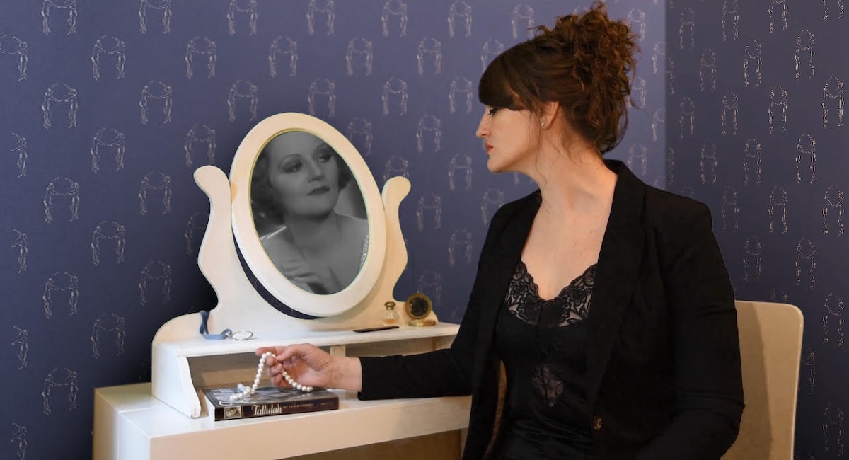 Woman looking into mirror