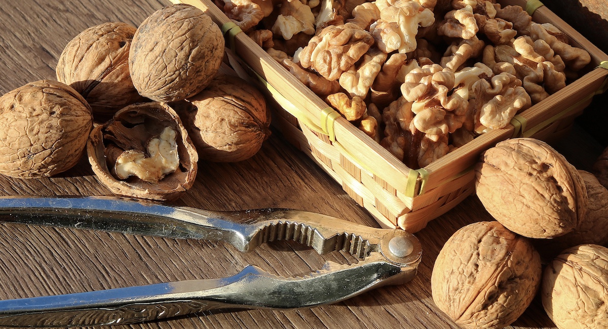 Box of walnuts and nutcracker