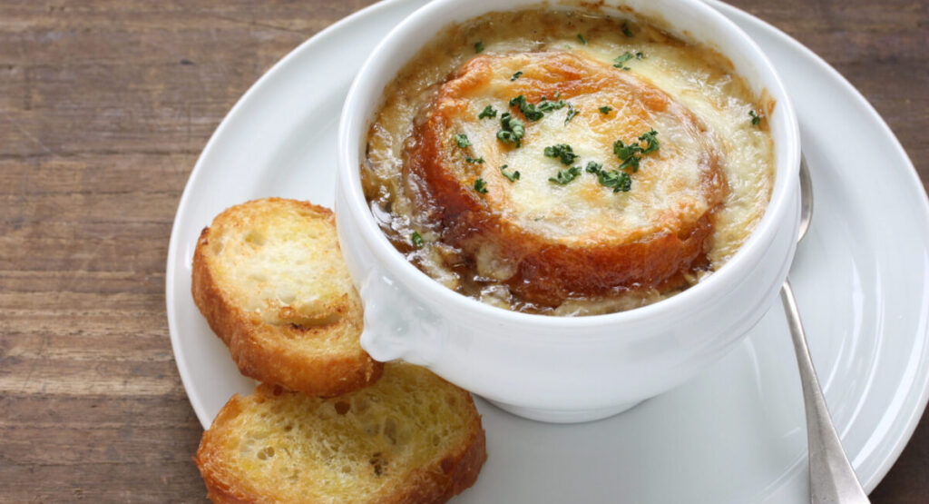 Onion soup with slices of bread.