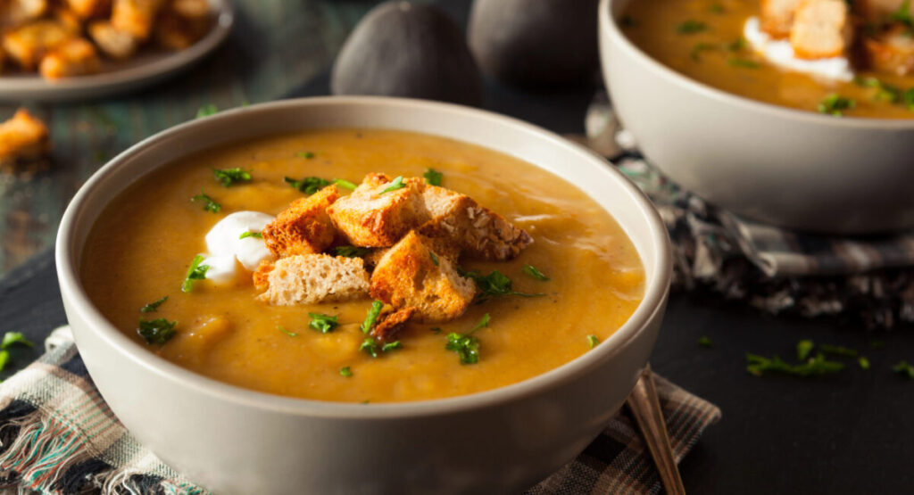 Pumpkin soup in a bowl.