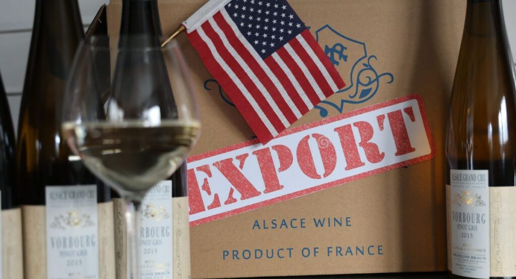 Wine glasses in front of an U.S. export box.
