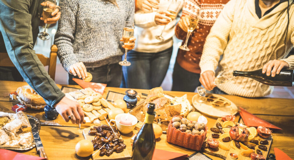 Friends tasting and drinking for New Year.