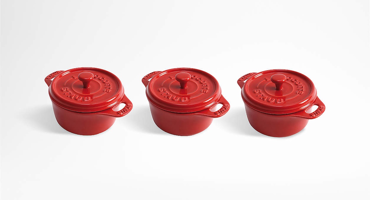 Set of three red Staub mini cocottes