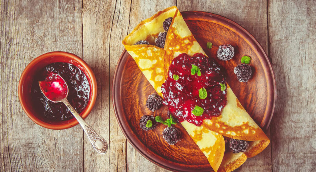 Crepes filled with raspberry jam.