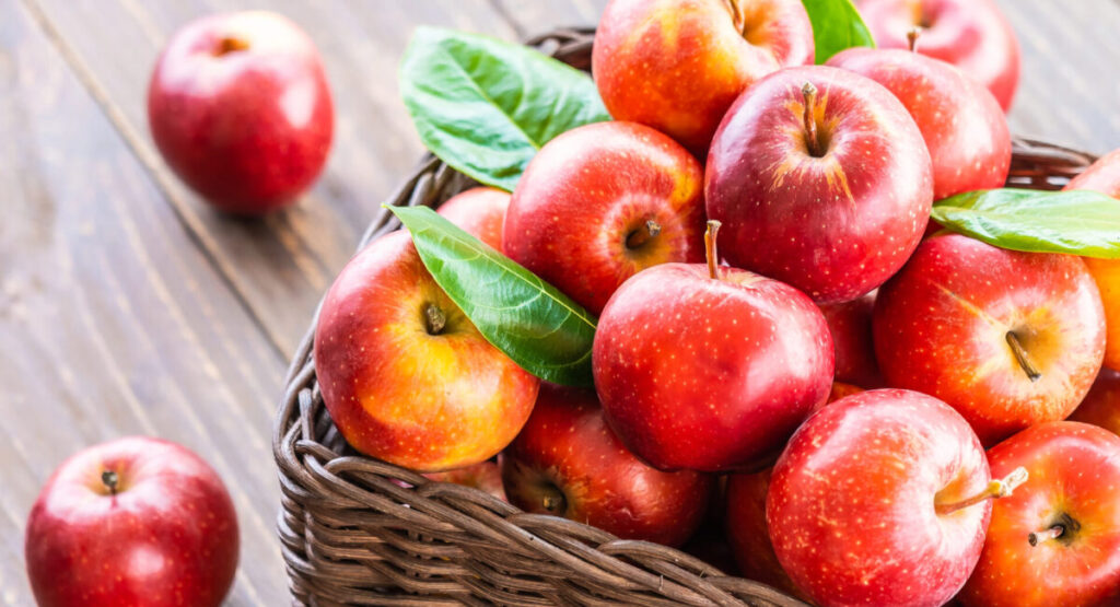 Red apples in a basket.