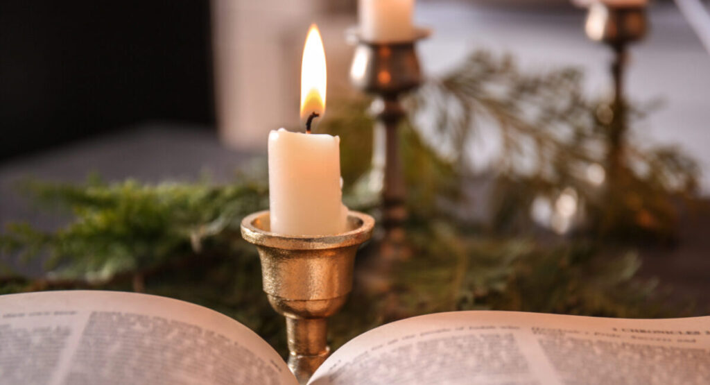 Open Bible on a table.