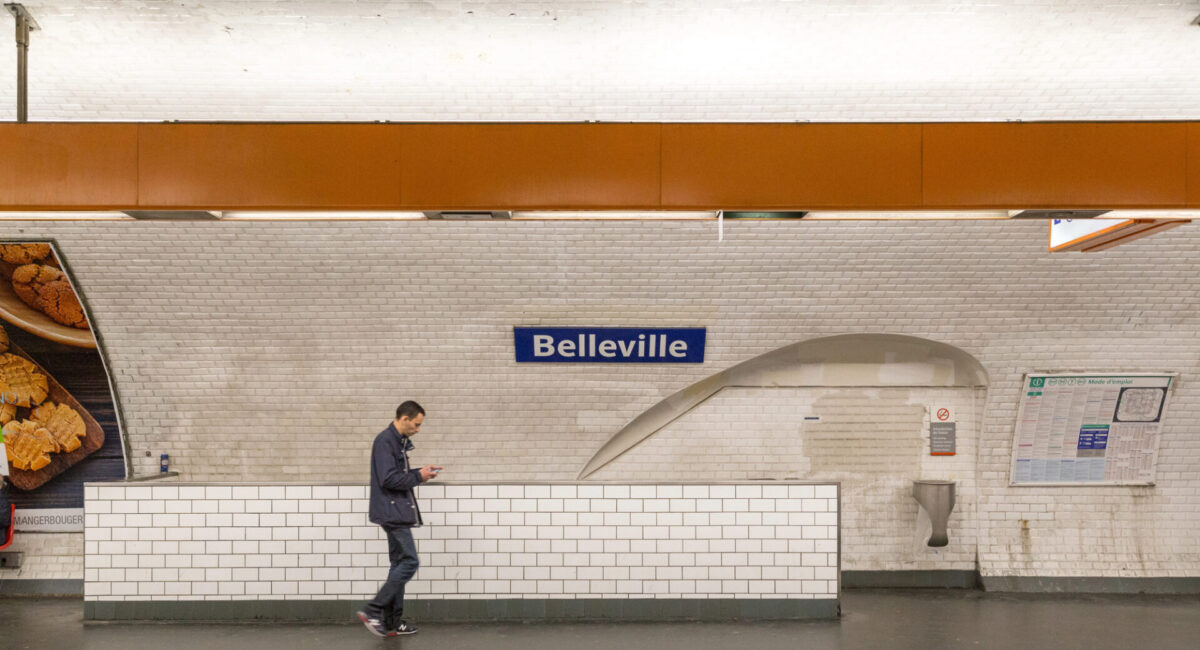 man walkign at Belleville train station