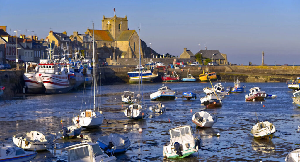 Port at low tide at the end of the sunny day.